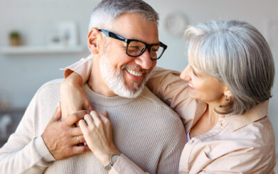 Beautiful smiling senior family couple husband and wife looking at each other