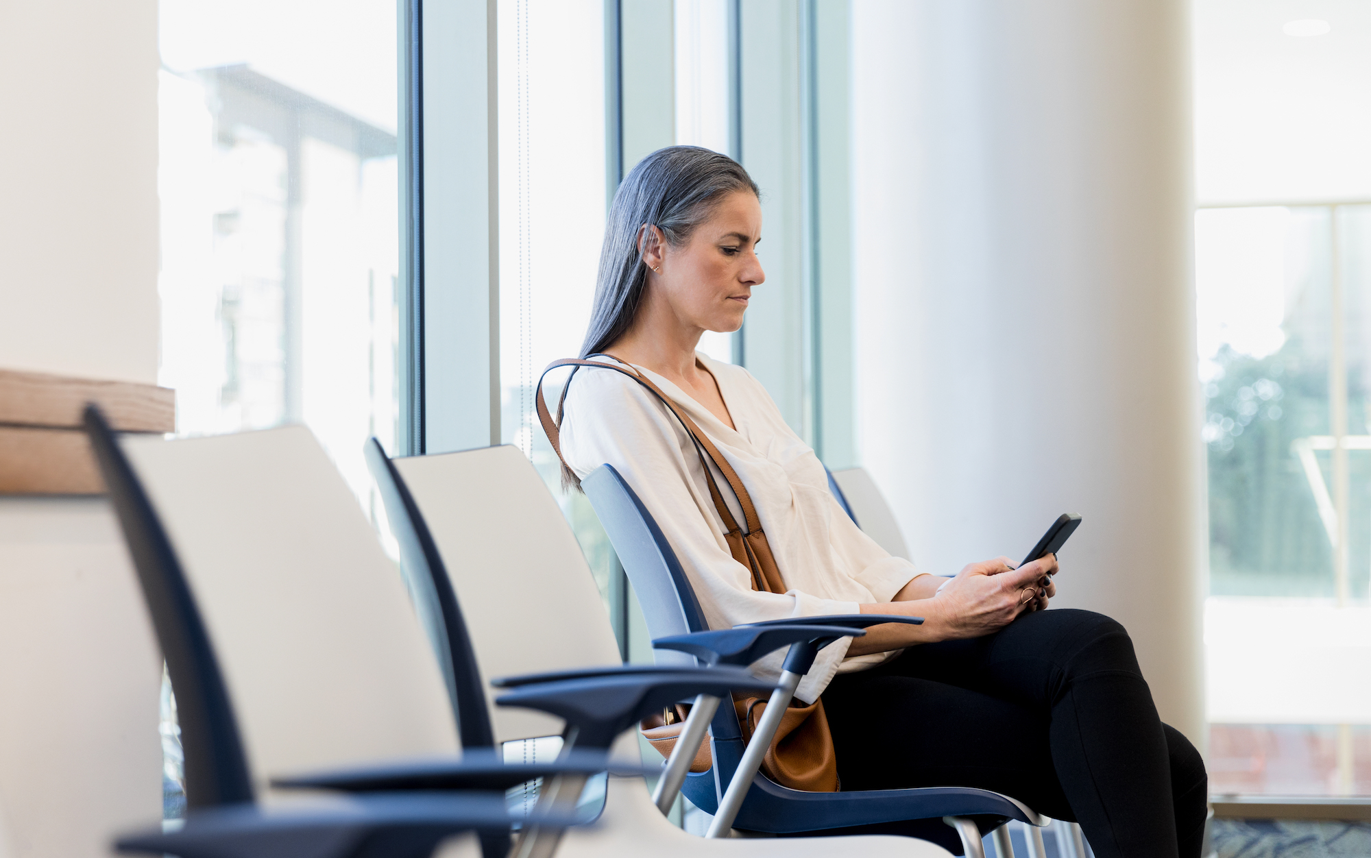 Woman in waiting room at doctor's office